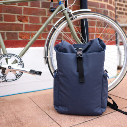 Commuting roll top backpack in blue
