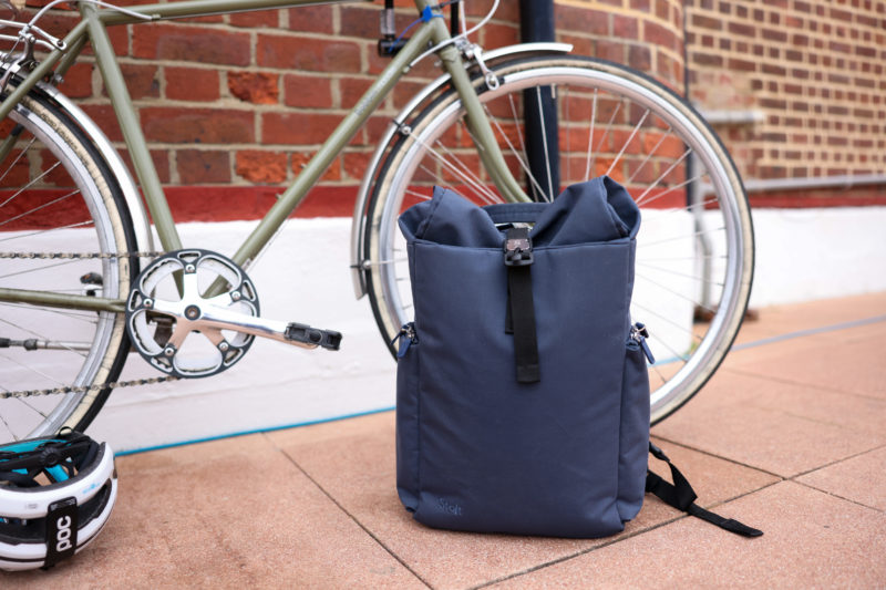 Commuting roll top backpack in blue